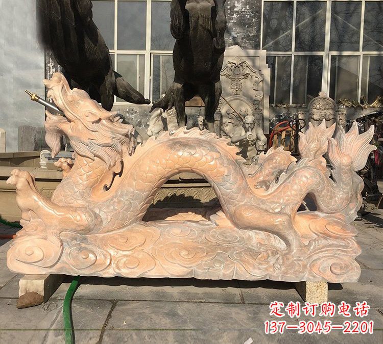龙岩晚霞红石雕喷水龙