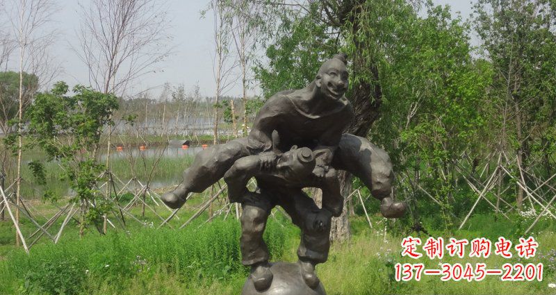 龙岩园林站在球上面跳山羊的人物景观铜雕